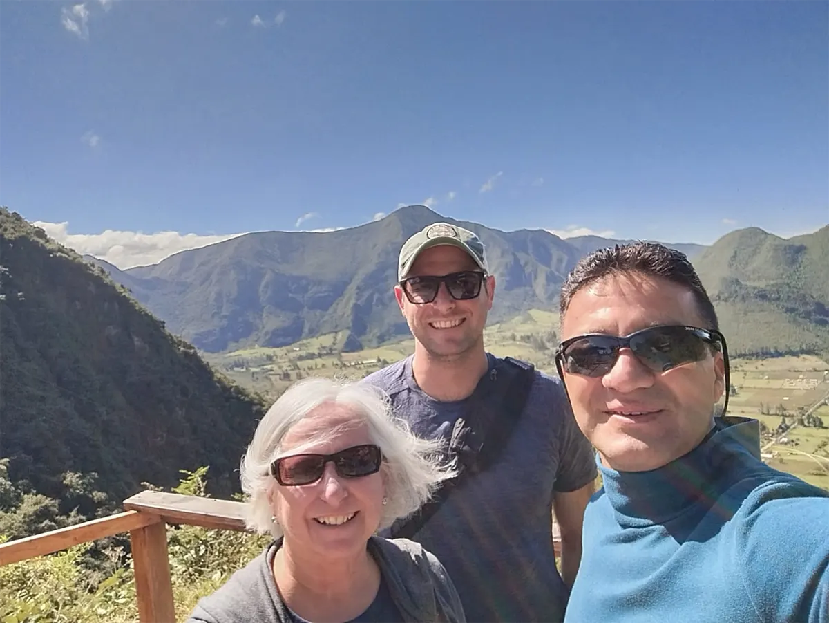 Cesar in the field with tourists